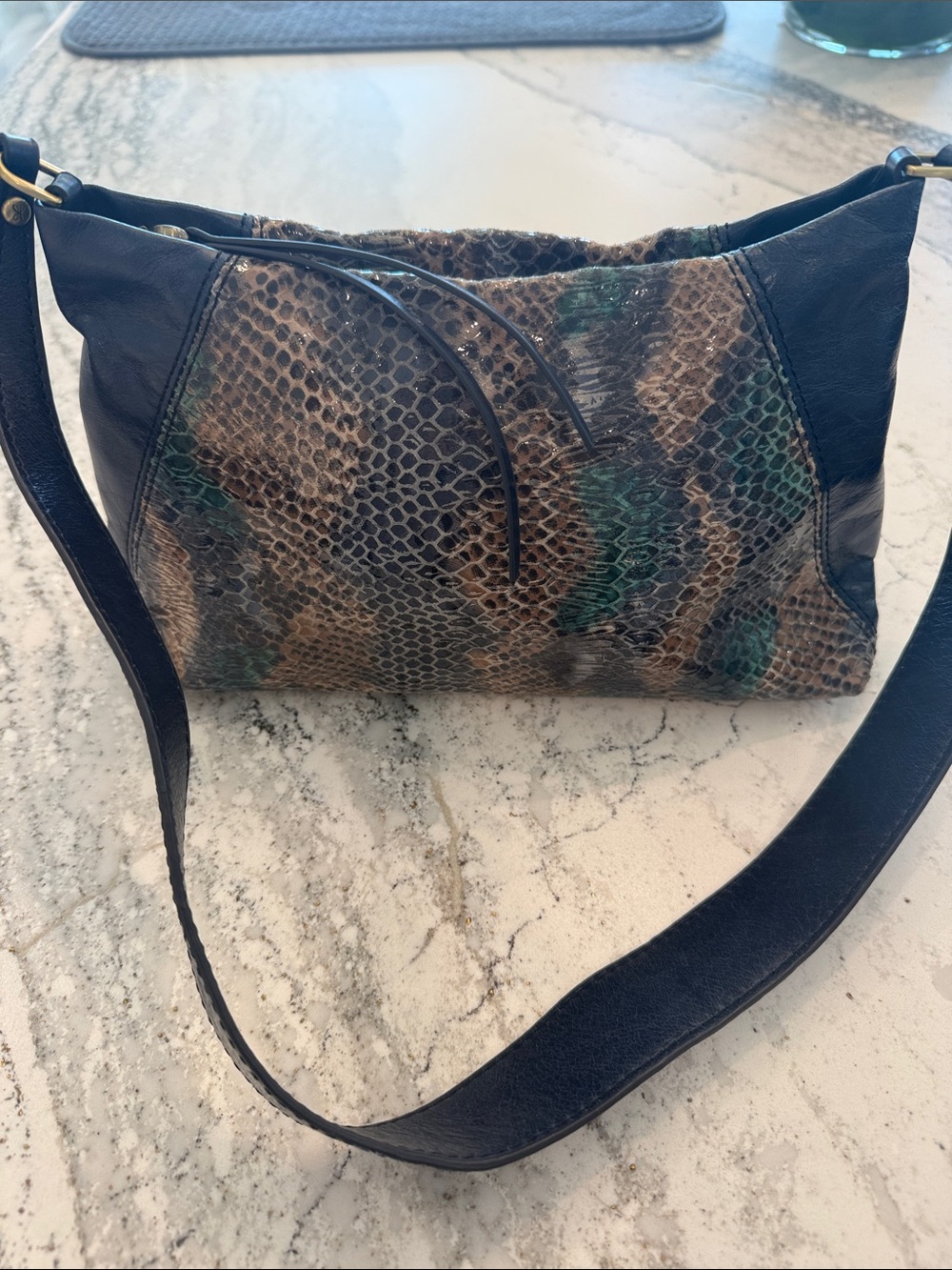 HOBO Women’s Snake-Print Shoulder Bag in Black and Brown